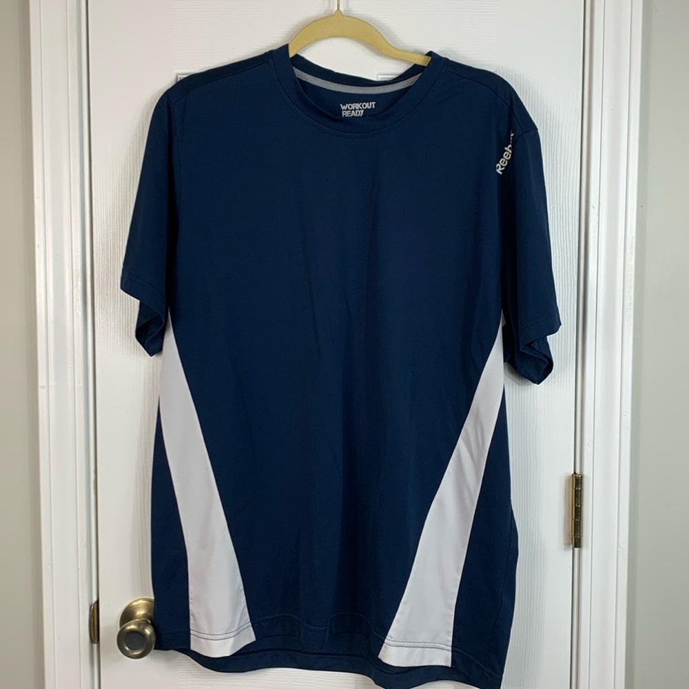Reebok Workout Ready navy blue short sleeved shirt size XL. White detail on side
